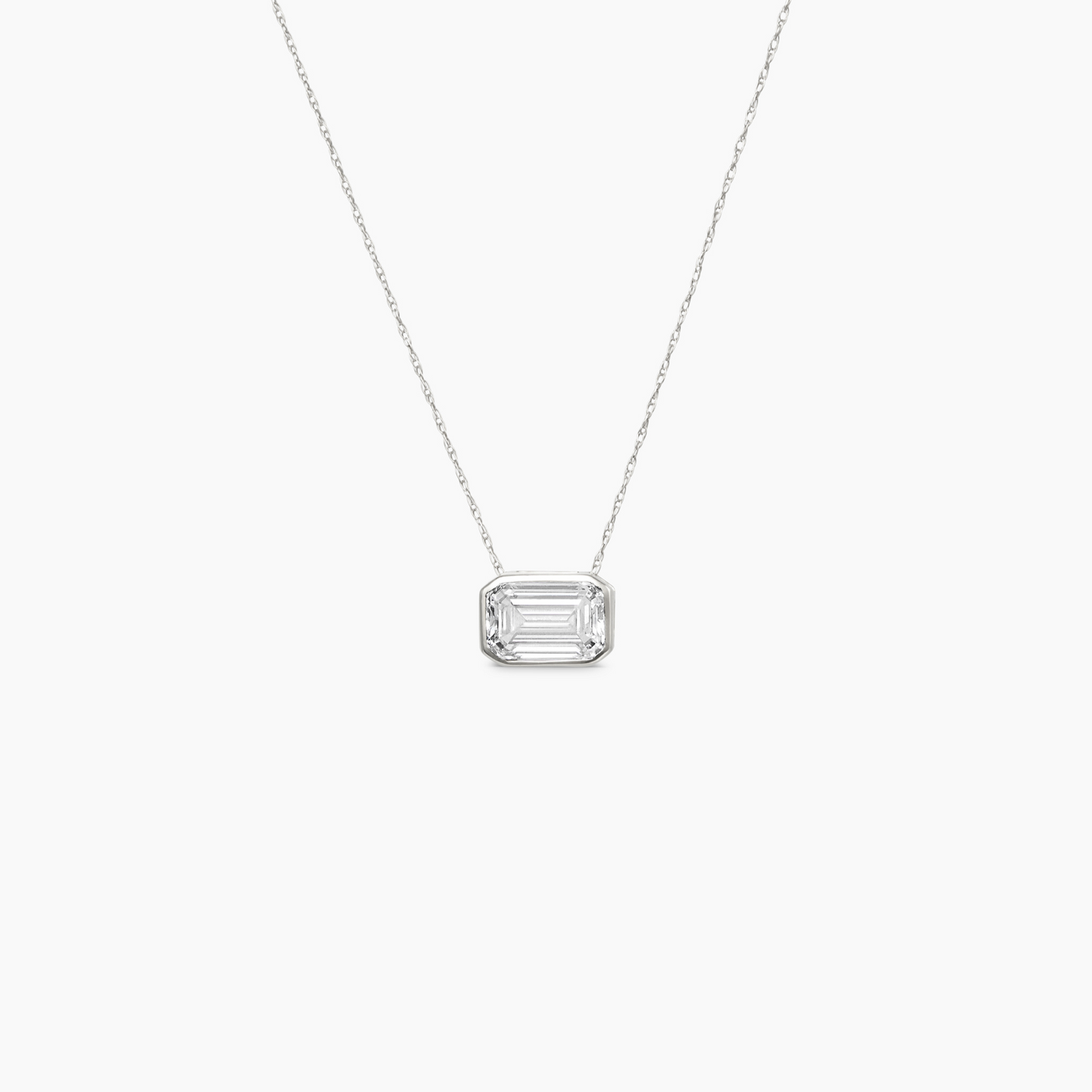 Erika Emerald Cut Bezel white Diamond Pendant